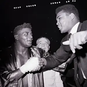 Cassius Clay Shaking Floyd Patterson's Hand
