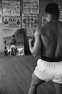 Cassius Clay Watching Himself in a Mirror