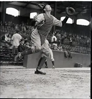 Catching Prints: Catcher Bill Dickey Tries To Catch Ball