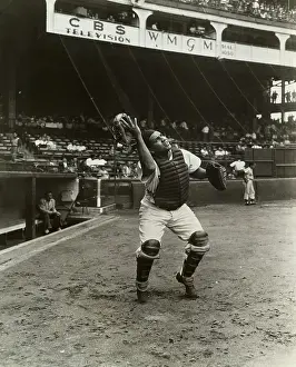 Removing Prints: Catcher Roy Campanella Watches Ball During Baseball Game