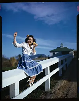 Catherine McLeod Sitting on a Fence