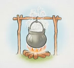 Cauldron boiling over open fire, front view