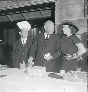 Cecil B Prints: Cecil B. Demille Cutting Cake
