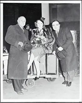 Cecil B Prints: Cecil B. DeMille and Film Stars Posing Near Luggage