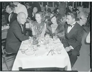 Cecil B Prints: Cecil B. Demille and Friends at Dinner Table