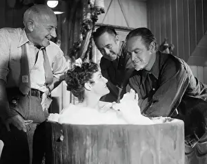 Cecil B. Demille and Friends Oversee Jane Russell's Bathtub Scene