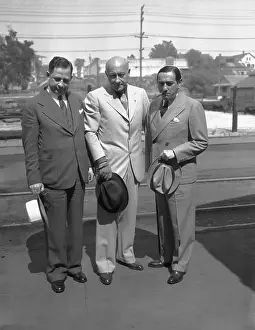 Cecil B Prints: Cecil B. Demille Posing With Paramount Officials