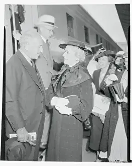 Cecil B Prints: Cecil B. DeMille Talking With His Wife at Train Station