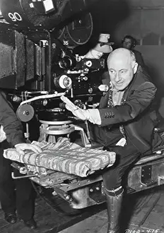 Cecil B. DeMille Working Behind Camera