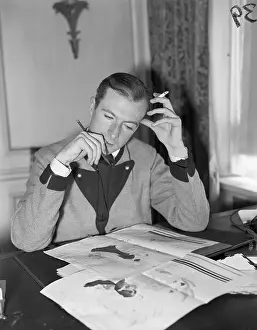Cecil Beaton @Desk W/Cigarette & Papers
