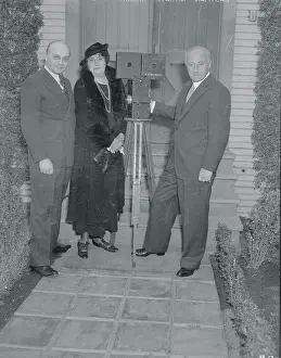 Cecil DeMille Posing With Performers