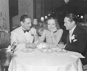 Prints of (Original Caption). Los Angeles, Calif.: Many celebrities attend the opening of Guy Lombardo's famous orchestra at the Cocoanut Grove Ambassador Hotel, Los Angeles, Calif A Glamorous Life Captured: Celebrities Attending Orchestra Opening