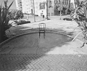 Henri Silberman Collection Gallery: Empty chair in patio by intersection