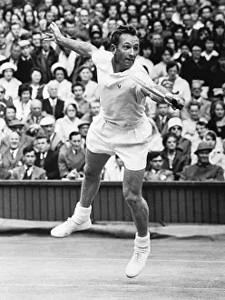 Champion Laver Reaching For Return