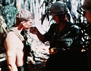 Chaplain Administering Holy Communion to a Soldier