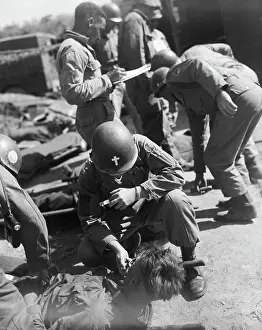 Chaplain Lights Wounded Soldier'S Cigare