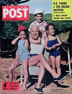 Prints of 15th September 1956: English comic actor, filmmaker, and composer Charlie Chaplin (1889 - 1977) on holiday with his children Michael, Josephine, and Victoria Master of Mime, Icon of Cinema: Chaplin in Prints: The Chaplin Family On Holiday