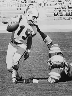Quarterback Prints: Chargers Earl Faison Sacking Jack Kemp