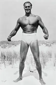 Swim Trunks Prints: Charles Atlas Flexing Muscles on Beach