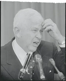 Frustration Prints: Charles E. Wilson Scratching Head