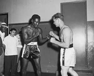 Intimidation Prints: Charles Ezzard and Gus Lesnivich Squaring Off
