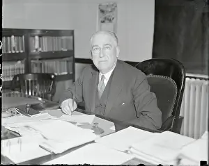 Charles H. March at His Desk