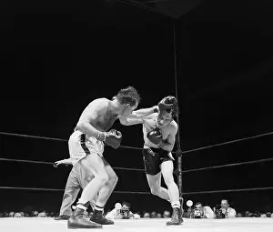 Photojournalist Prints: Charles Humez Boxing Against Gene Fullmer