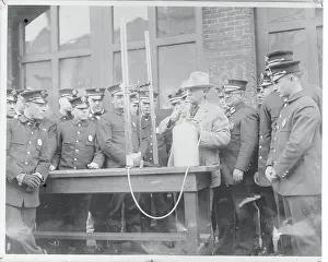 Charles Kellogg Demonstrating With His Device