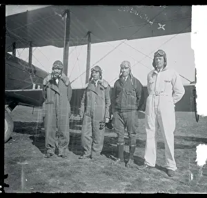 Charles Lindbergh and Fellow Pilots Posing Near an Airplane