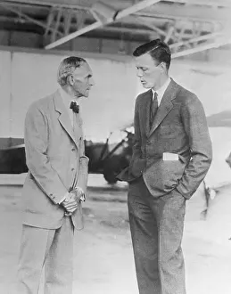 Charles Lindbergh Talking With Henry Ford on His Left