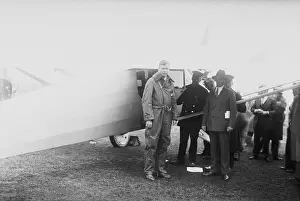 Charles Lindbergh in Togs and Conversing With Others