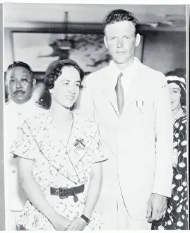 Charles Lindbergh and His Wife Wearing Medals