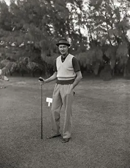Socialite Prints: Charles Munn Standing on Golf Course
