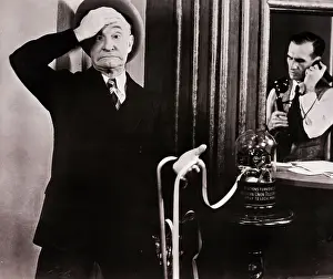 Risk Prints: Charles Murray Reading Ticker-tape in Clancy in Wall Street