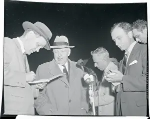 Charles Wilson Talking to Newsmen