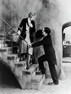 Charlie Chaplin and Costar in Scene from City Lights