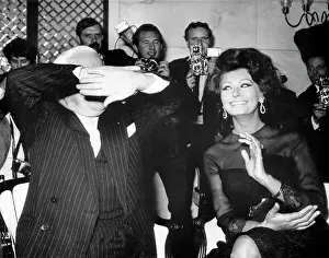 Charlie Chaplin Covering His Face