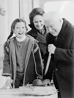 Oona Oneill Prints: Charlie Chaplin Cutting Birthday Cake