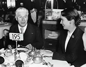 Oona Oneill Prints: Charlie Chaplin Dining with Oona Chaplin