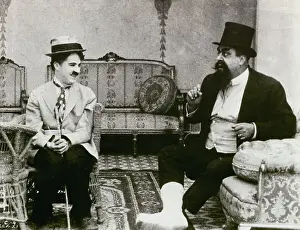 Prints of Charlie Chaplin (left) and unidentified actor in the 1917 silent film, The Cure Master of Mime, Icon of Cinema: Chaplin in Prints: Charlie Chaplin (Left) in Film Scene