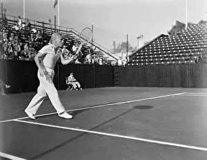 Charlie Chaplin Playing Tennis