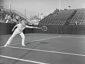 Charlie Chaplin Playing Tennis