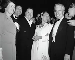 Charlie Chaplin Posing with Colleagues