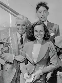 Charlie Chaplin Posing with Paulette Goddard and Jean Cocteau