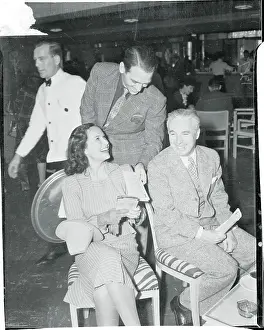 Charlie Chaplin and Others at Race Track