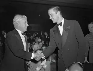Charlie Chaplin Shaking Hands with Franklin Roosevelt Jr
