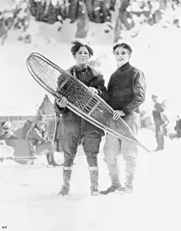 Prints of (Original Caption). Charlie Chaplin with Sid Grauman, Californias spectacular impresario. Grauman was among those who made the famous gold rush to the Klondike in 1898 Master of Mime, Icon of Cinema: Chaplin in Prints: Charlie Chaplin with Sid Grauman