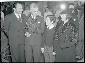 Edward G Prints: Charlie Chaplin Speaking with Colleagues