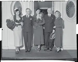 Charlie Chaplin Standing with Others