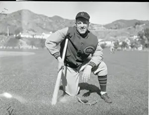 Charlie Grimm Leaning on Baseball Bat
